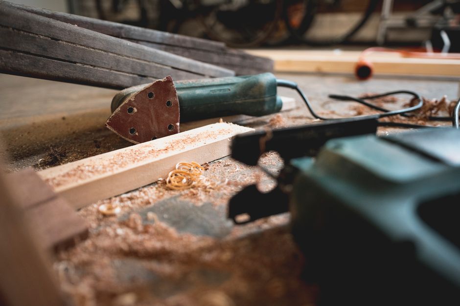Detail shot of traditional woodworking tools and wood shavings